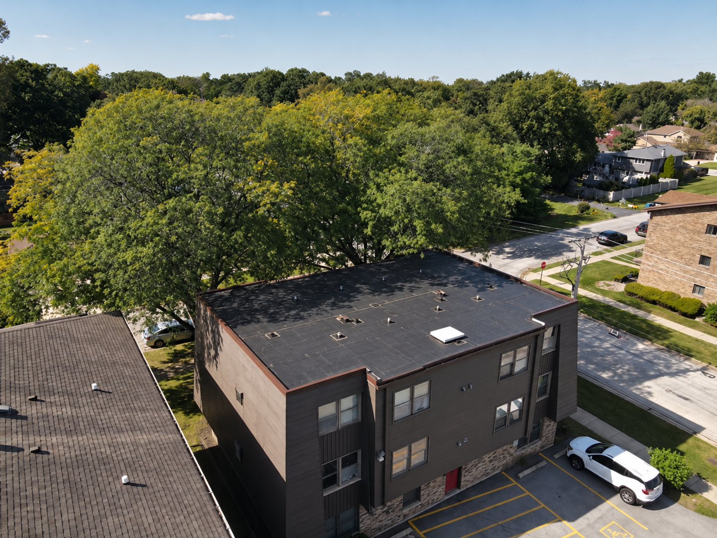 Aerial view of the Midlothian project roof and nearby trees